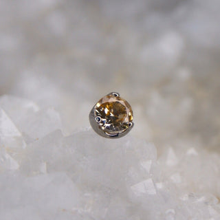 junipurr prong set cz cubic zirconia gem in threadless push fit verified implant grade titanium gemmed earrings gift for him for her piercing lovers affordable accessible titanium jewelry uk junipurr stockist champagne