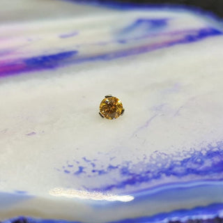 industrial strength amber cz prong set gem