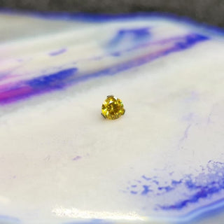 industrial strength sunshine yellow prong set gem