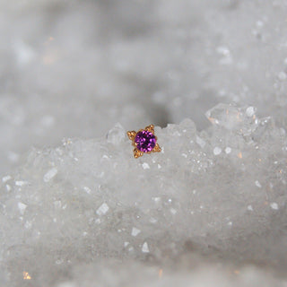 anatometal 18k rose gold zia with beaded accent and faceted rhodolite cartilage stud earring 