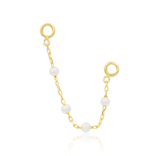 junipurr jewellery louise piercing chain with genuine freshwater pearls. nose or scaffold chain in 14k yellow gold.