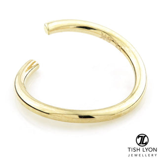 Tish Lyon - 14K GOLD SEAMLESS TWIST NOSE RING
